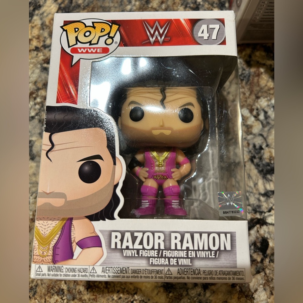 Funko Pop! WWE Razor Ramon Vinyl Figure in Pink and Gold